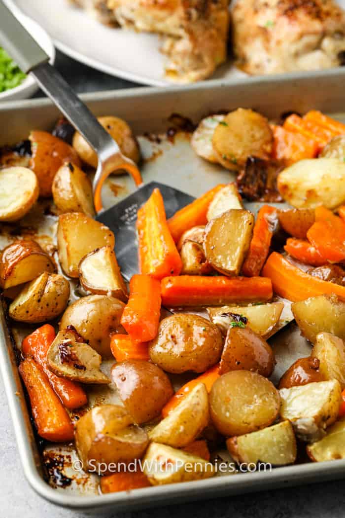 plating Chicken and Potatoes from a baking sheet