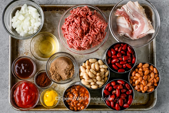 ingredients for Cowboy Baked Beans on a baking sheet