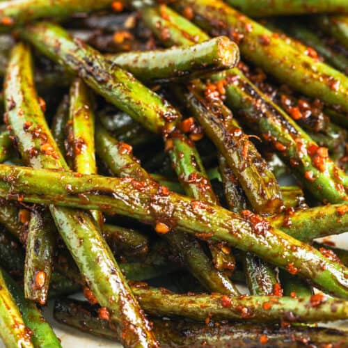 Szechuan Green Beans piled on a white plate