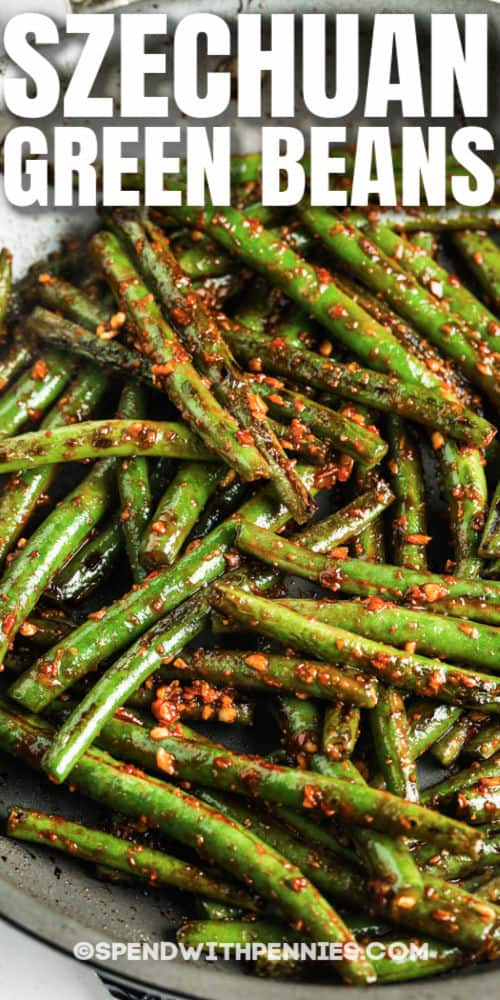 Szechuan Green Beans in the pan with a title