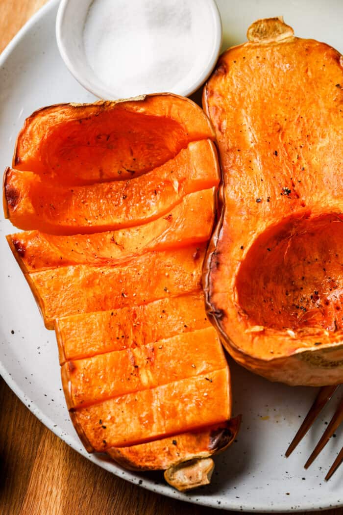 close up of Air Fryer Butternut Squash on a plate with a fork