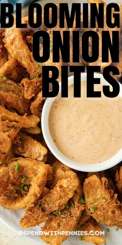 Blooming onions can be made right at home with ease! Make them on the stovetop, in the oven, or use the Air Fryer. Don't forget the dip! #spendwithpennies #bloomingonion #recipe #appetizer #airfryer #easy #best #homemade #mini #deepfried top view of Blooming Onion Bites with dip and a title