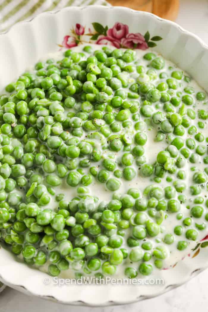 Creamed Peas in a white bowl