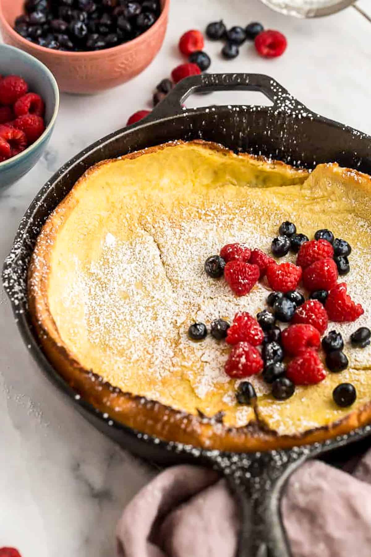 Dutch baby pancake with berries on top