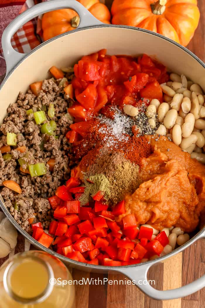ingredients for Pumpkin Chili in a pot with cooked beef