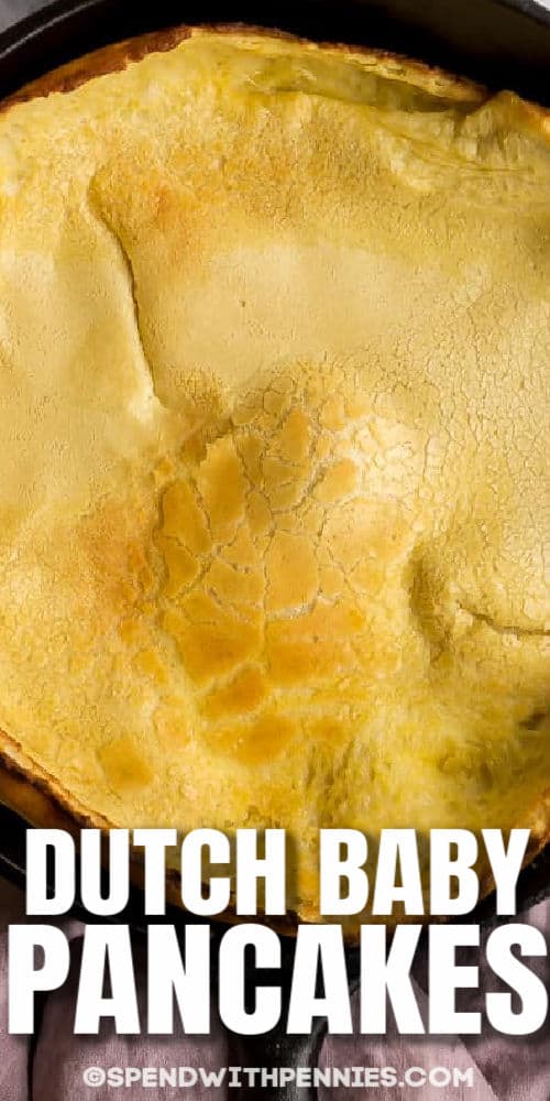 close up of cooked Dutch Baby with a title