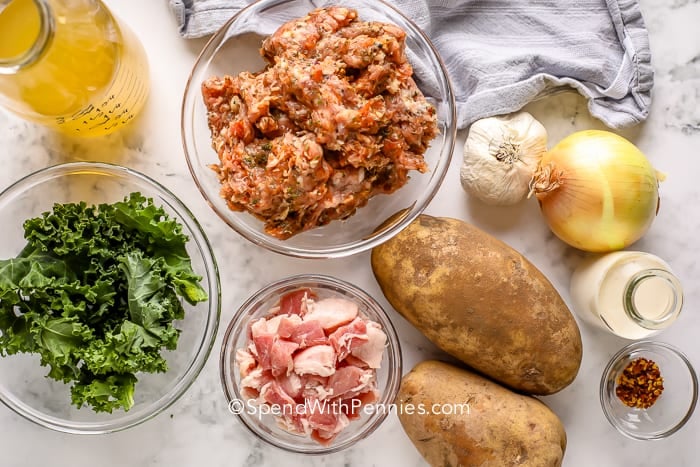 Zuppa Toscana ingredients on a marble board