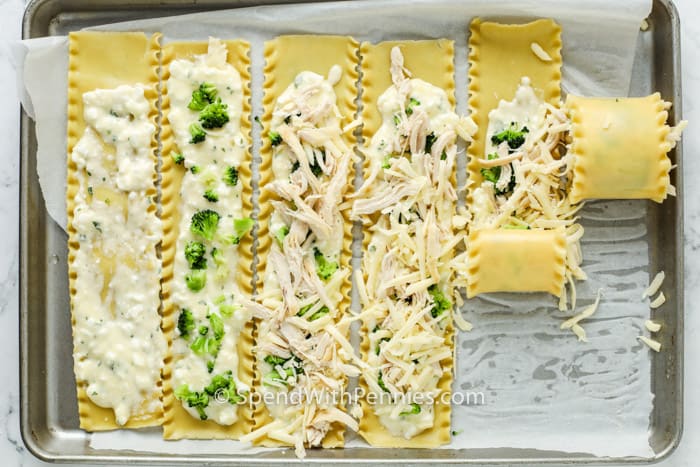 process of rolling Chicken Lasagna Roll Ups