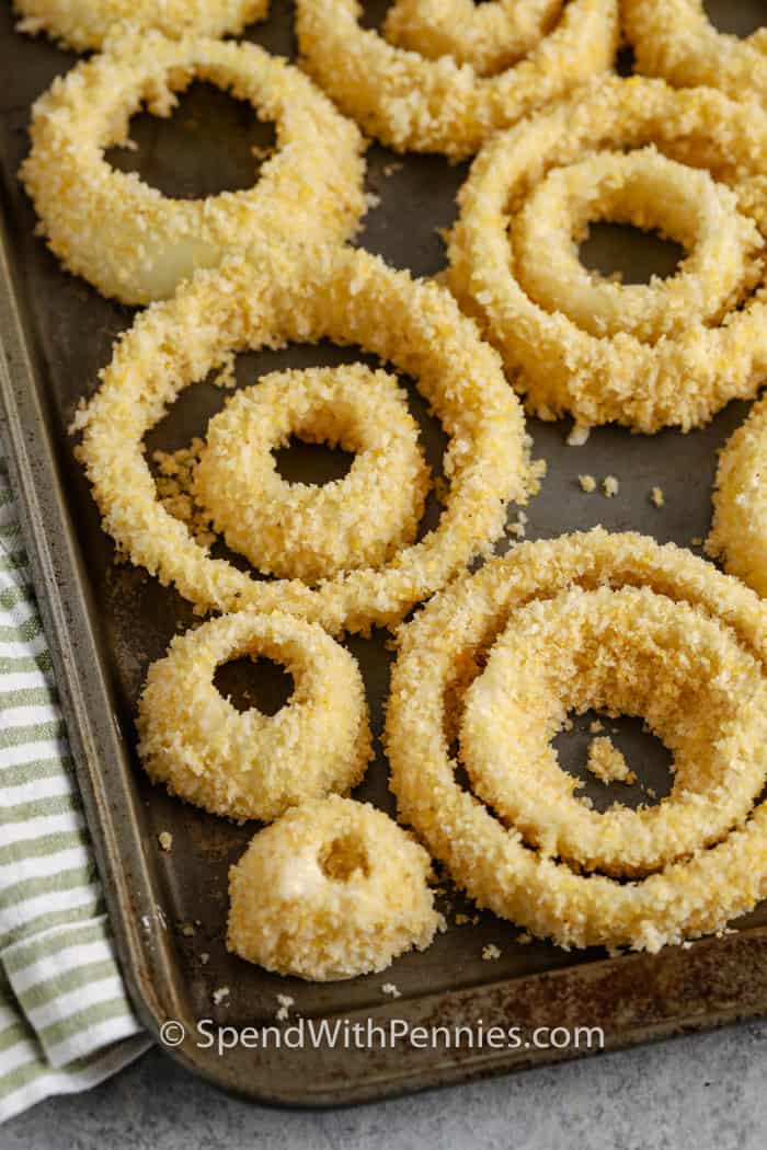 breaded Air Fryer Onion Rings on a baking sheet before cooking