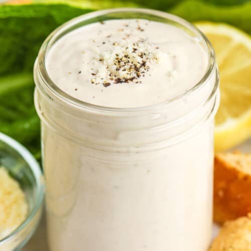 close up of Quick Caesar Salad Dressing in a jar