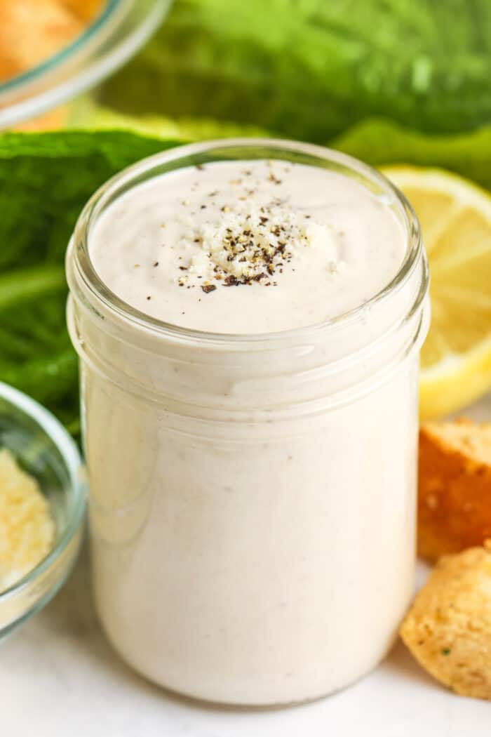 close up of Quick Caesar Salad Dressing in a jar