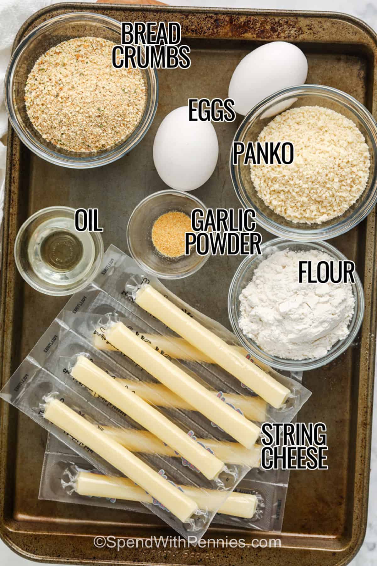 panko , eggs , bread crumbs , oil , garlic powder , flour , string cheese with labels to make Air Fryer Mozzarella Sticks