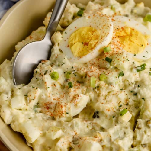 Mashed Potato Salad in a bowl with a serving spoon