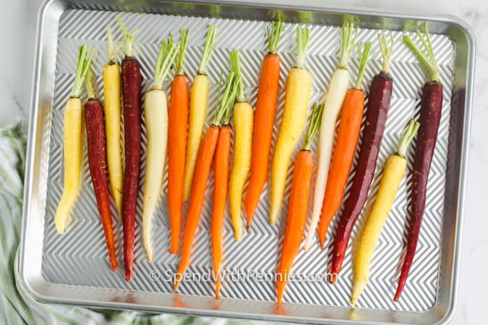 Roasted Rainbow Carrots on a baking sheet before cooking