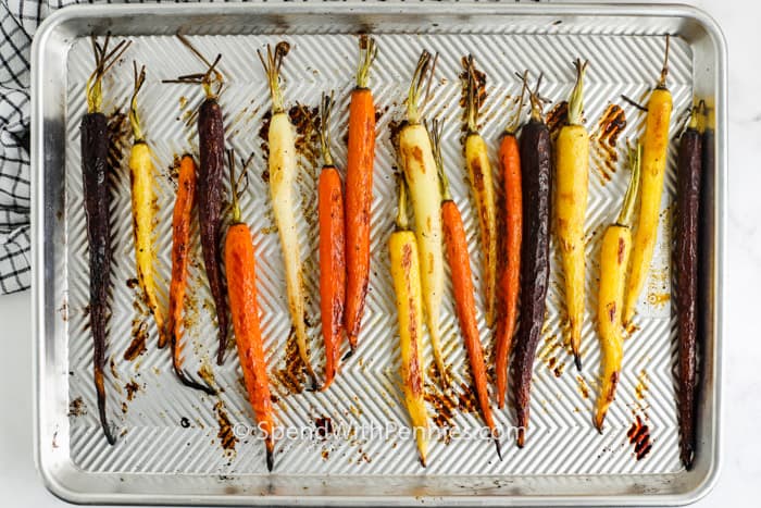 Roasted Rainbow Carrots on a baking sheet after cooking