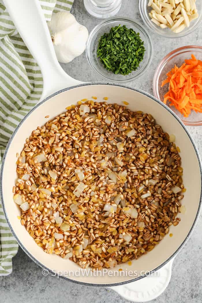 ingredients in bowls and pot to make Farro Pilaf