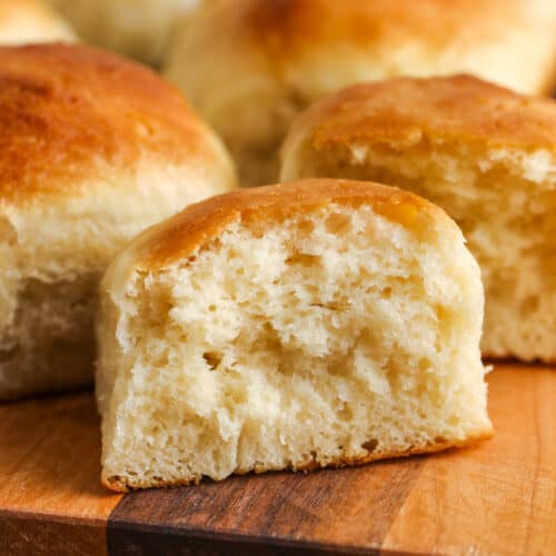Dinner Rolls with one in half to show the inside