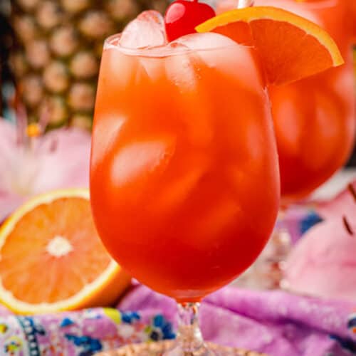 Bahama Mama Cocktail with a an orange slice and cherry