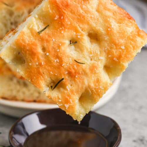 Focaccia Bread dipped in sauce