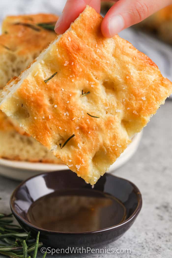 Focaccia Bread dipped in sauce