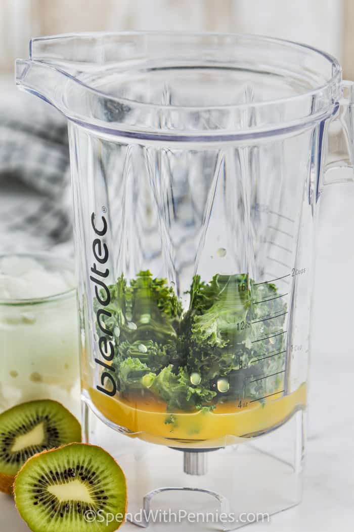 Kiwi Smoothie ingredients in a blender before being blended