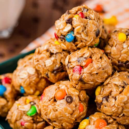 monster cookie energy balls on a blue plate