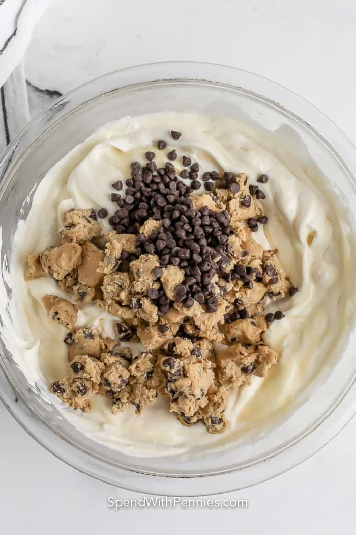 Ingredients to make cookie dough ice cream in a bowl