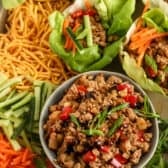 top view of Turkey Lettuce Wraps on a pan with filling and toppings