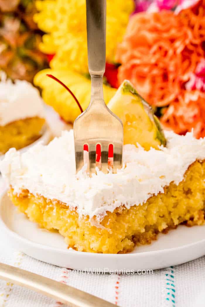 close up of Pina Colada Cake on a fork