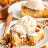 piece of Pumpkin Crunch Cake on a plate with bite taken out