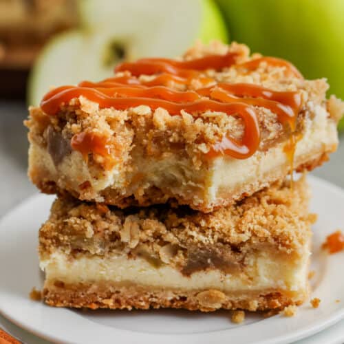 pieces of Caramel Apple Cheesecake with a bite taken out of one
