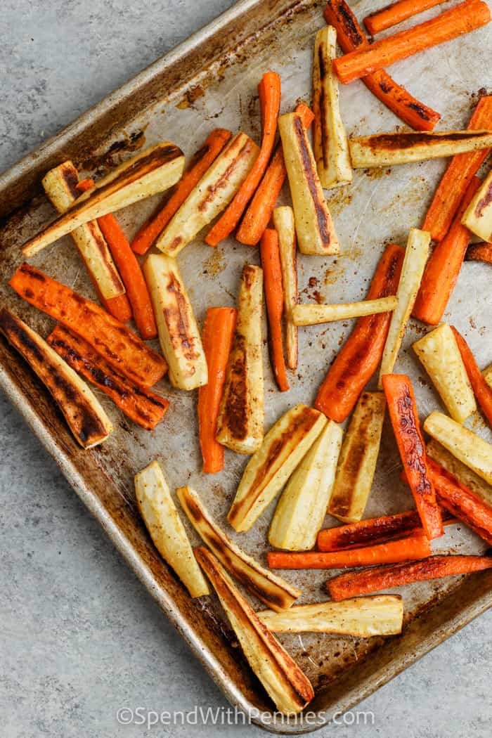 baked Carrots and Parsnips on a baking sheet