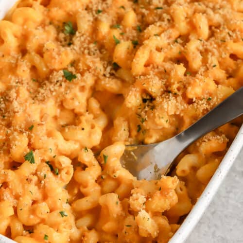 Butternut Squash Mac and Cheese in a dish with a spoon