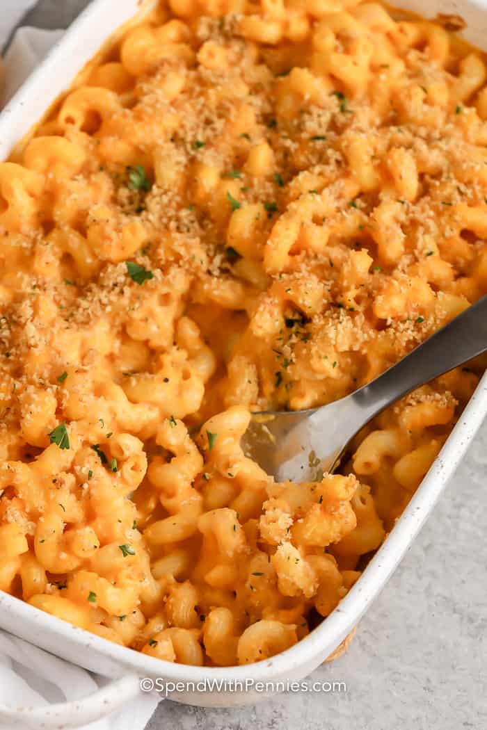 Butternut Squash Mac and Cheese in a dish with a spoon