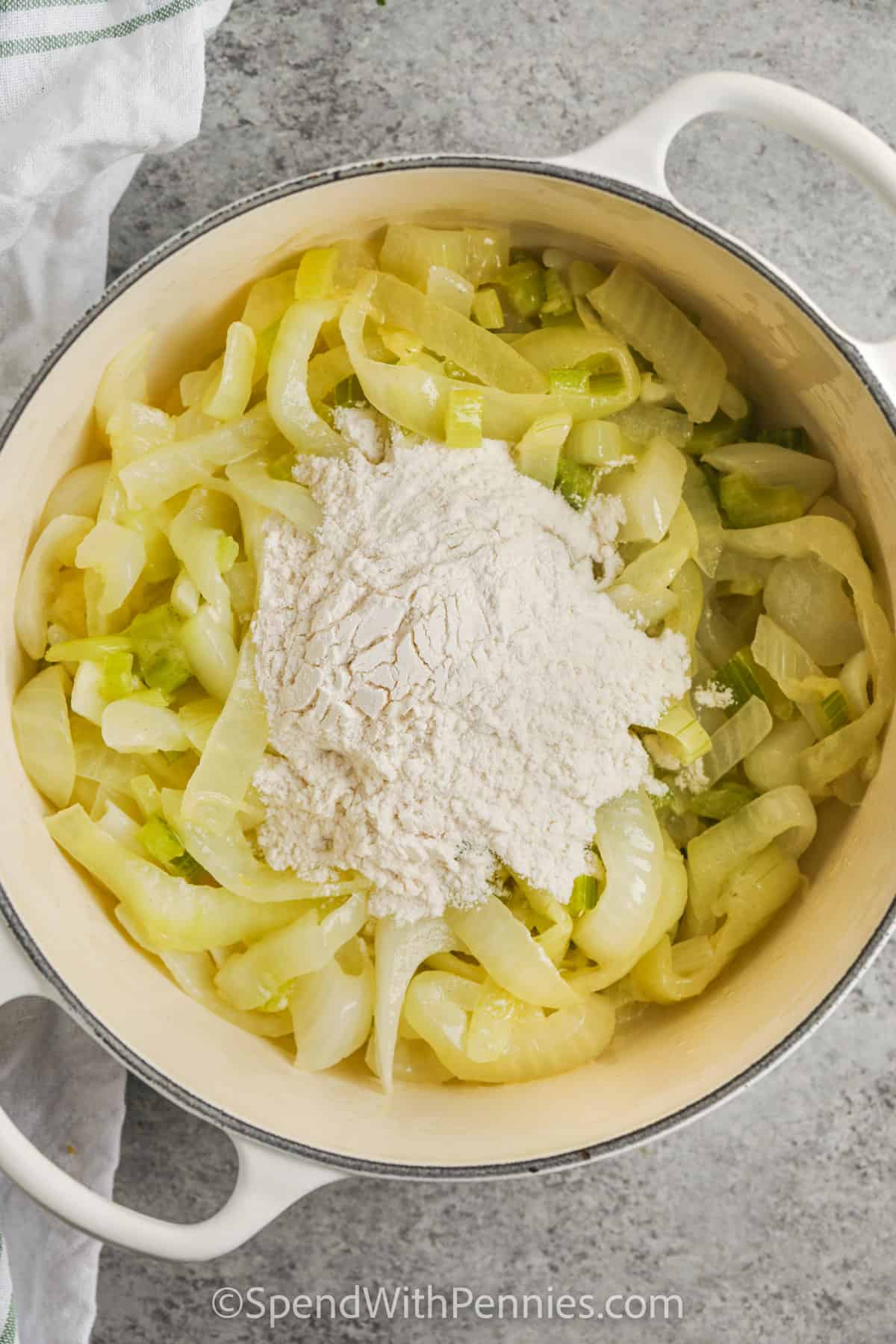 adding flour to pot to make Cream of Onion Soup