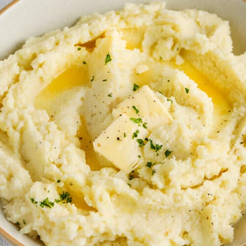 close up of Mashed Parsnips and Turnips with melted butter