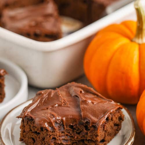 Fudgy Pumpkin Brownies with a bite taken out of one piece