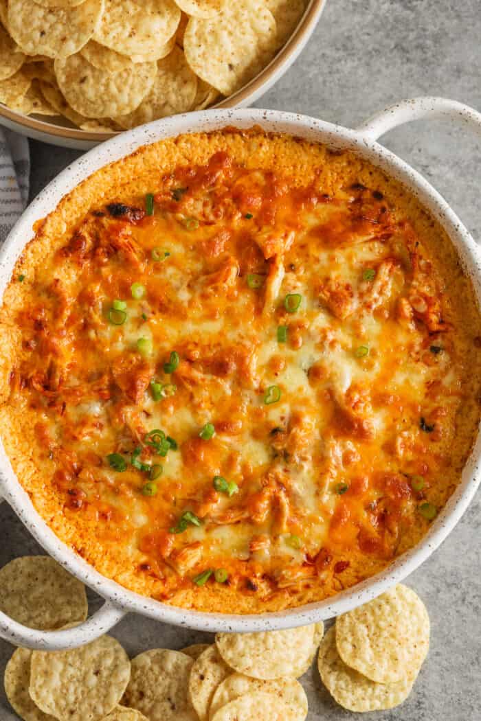 plated Buffalo Ranch Chicken Dip with a bowl of chips