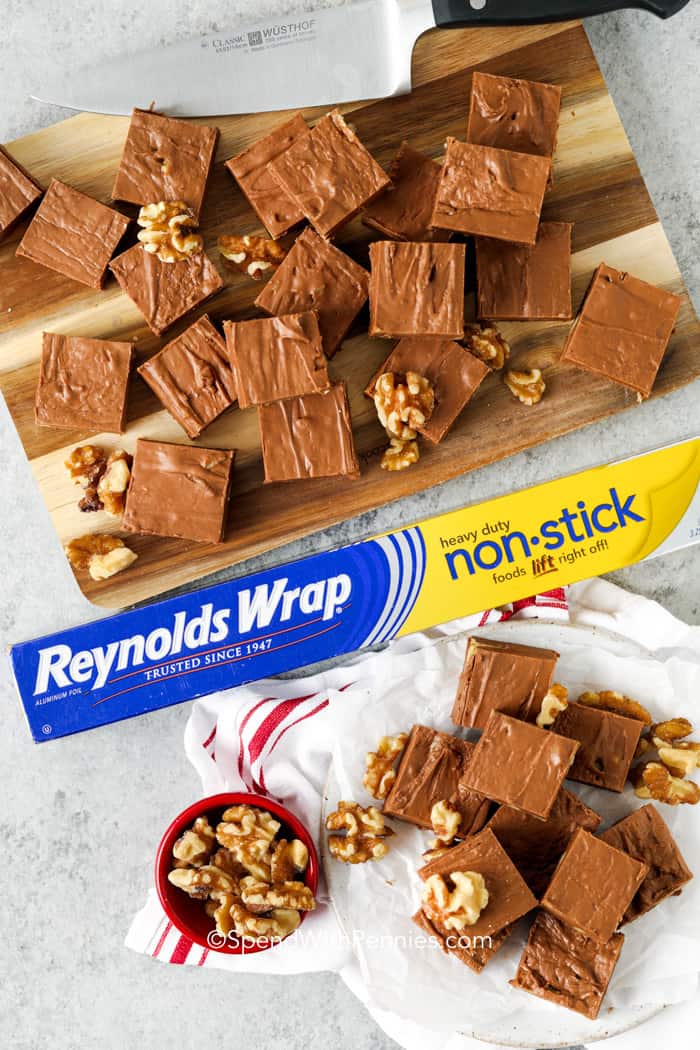 Fantasy Fudge cut into squares with reynolds wrap