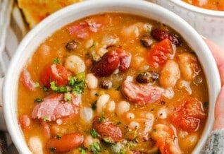 two bowls of 15 bean soup with cornbread