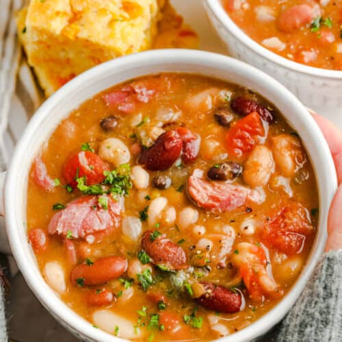 two bowls of 15 bean soup with cornbread
