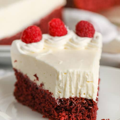 plated Easy Red Velvet Cheesecake with a bite taken out