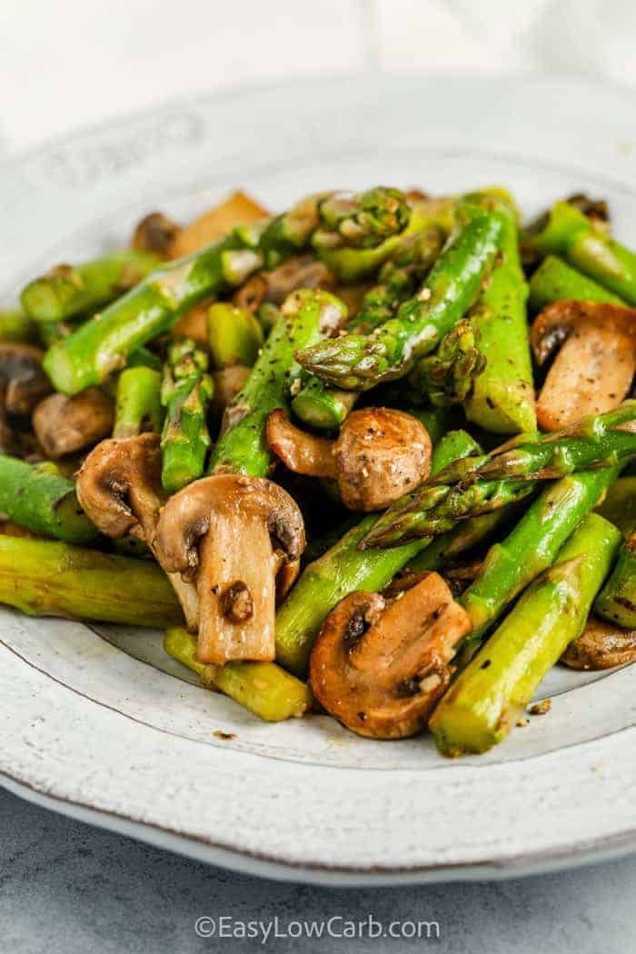 Sauteed Asparagus and Mushrooms on a serving dish