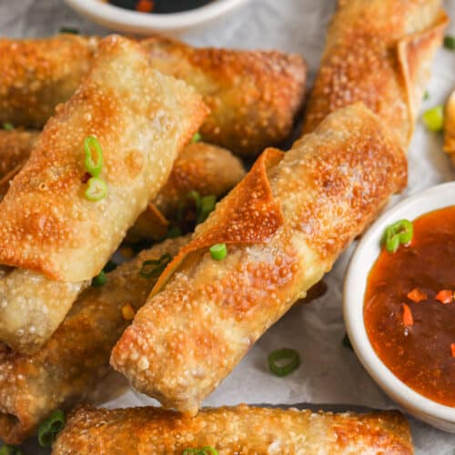 cooked Crispy Homemade Egg Rolls with dip