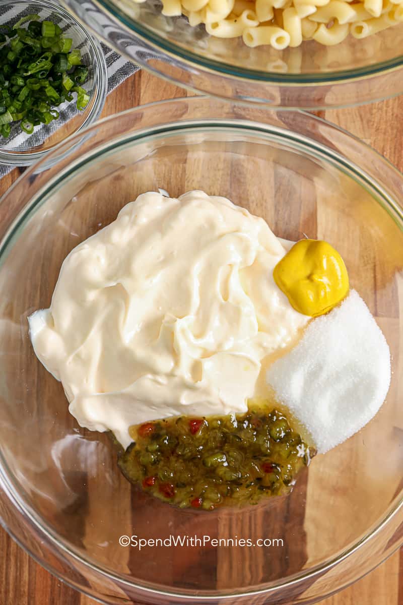 macaroni salad ingredients in a glass bowl