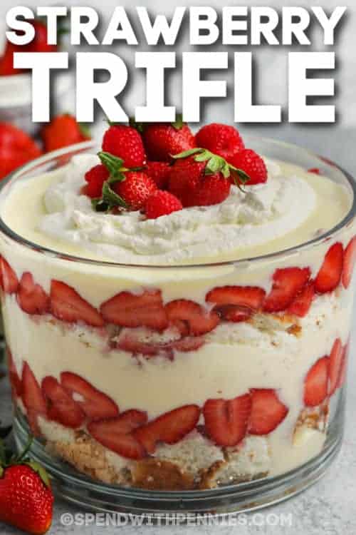Make this colorful layered trifle for an impressive and sweet dessert. In this recipe, moist white cake is layered with creamy and smooth custard, then topped with whipped cream. It makes for a totally decadent dessert! Easy to make, easy on the eyes, and so easy to eat. #trifle #triflerecipe #easytrifle #spendwithpennies Trifle with strawberries and whipped cream with a title
