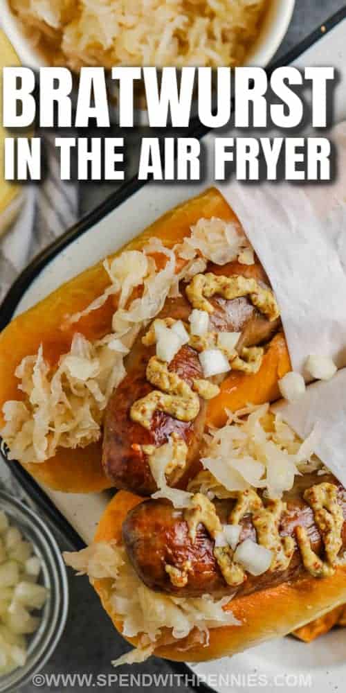 It won't take long to make some air fryer bratwurst for dinner tonight. Bratwurst turns out so crispy and juicy in the air fryer. Buy plain bratwurst or specialty ones that are stuffed with cheese and bacon. Cook these tonight for game day and watch them disappear! #airfryerbratwurst #bratwurstintheairfryer #airfryerbratwurst #spendwithpennies Air Fryer Bratwurst in buns with toppings and a title