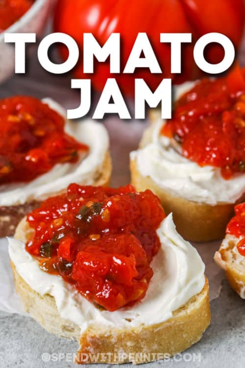 plated Tomato Jam on bread and cream cheese with a title