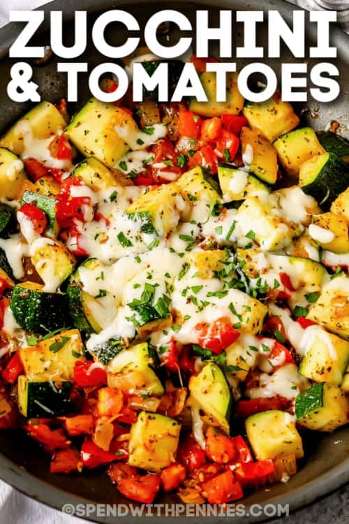 Try this colorful and flavorful side dish of zucchini and tomatoes. This recipe is a great way of using up that summer harvest of zucchini and tomatoes. Simply sautée the vegetables with some garlic, add some spices, and two kinds of cheese. So simple, so easy, and such a savory side. #zucchiniandtomatoes #sauteedzucchini #zucchiniandtomatoesrecipe #spendwithpennies pan of cooked Zucchini and Tomatoes with a title