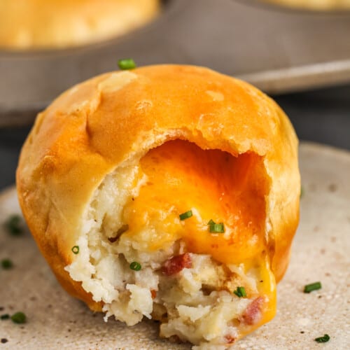 plated Loaded Mashed Potato Balls with a bite taken out